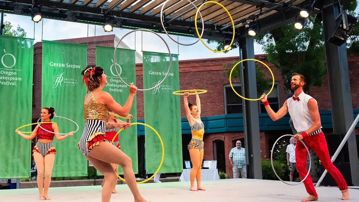 Hoop performers on the Green Show stage at the Oregon Shakespeare Festival.